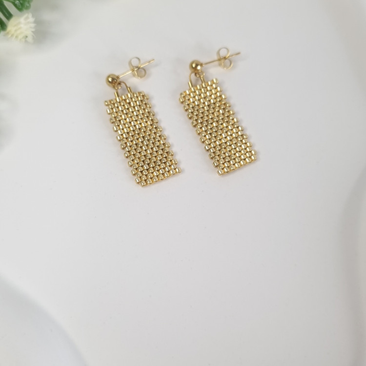 گوشواره دست ساز میوکی مدل آویز طرح طلا